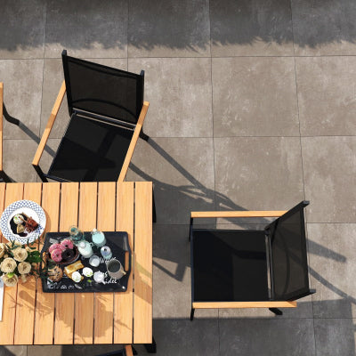 woodlike dining table under the sunshine