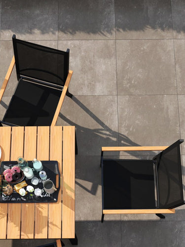 woodlike dining table under the sunshine